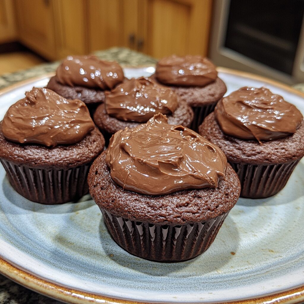 Ultimate Double Chocolate Cupcakes presented in natural light with a homemade look